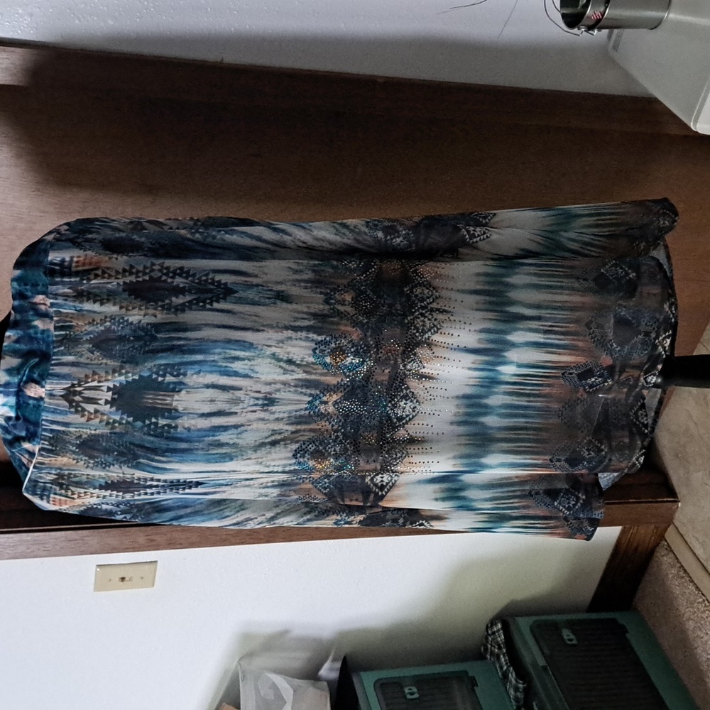Tribal XL skirt. Embellishments on the front.  Waist is 19 one side.  35 long.